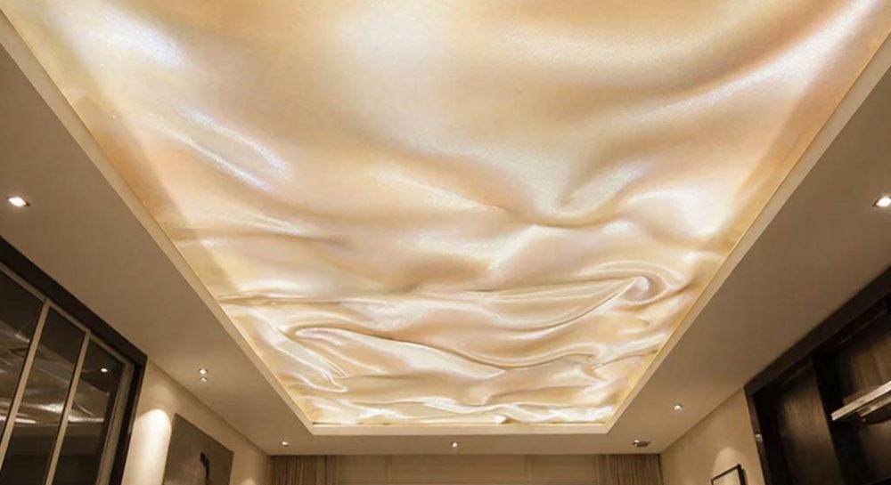Шёлковое небо в вашем интерьере: Почему мы выбираем сатиновые натяжные потолки для создания безупречного уюта